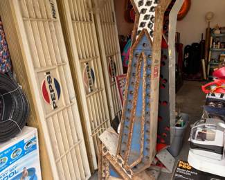 Large lighted arrows and Pepsi menu boards