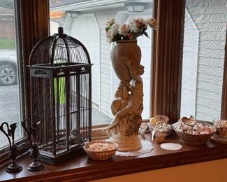 Dining Room-A. Carrier woman with urn, bird cage 