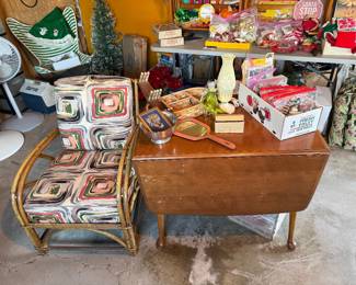 Drop leaf table, rattan chair with barkcloth cushions