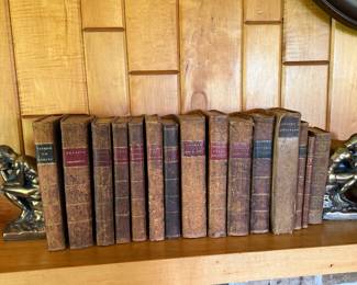 Family Room-leather bound 1800-1900 medical books, thinker bookends, 