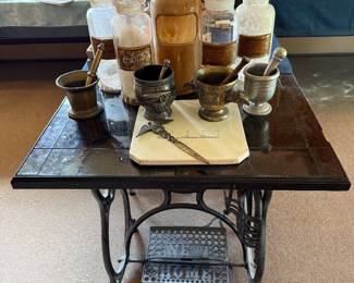 Family Room-sewing machine bottom, more apothecary jars, mortar & pestles