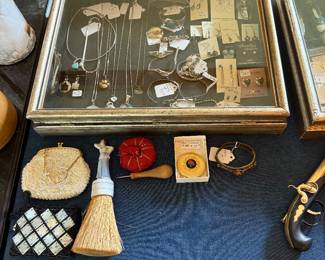 Case Table-Sterling jewelry, change purses, compact, doll brush