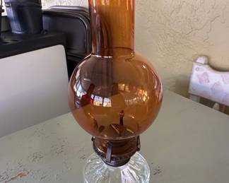 Wrought Iron Bistro Set with Heart Back Chairs and Amber Glass Oil Lamp