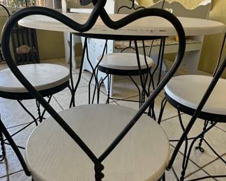 Wrought Iron Bistro Set with Heart Back Chairs and Amber Glass Oil Lamp
