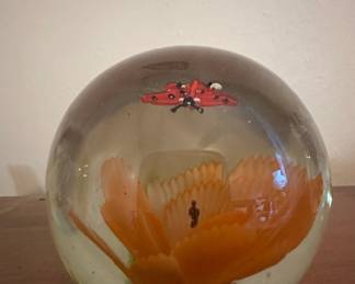 Glass Paperweight with Embedded Ladybug and Flower