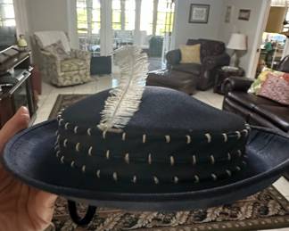 Dark Blue Wide-Brimmed Hat with Feather and Decorative Stitching