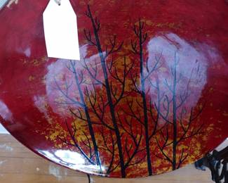Large round red shallow bowl