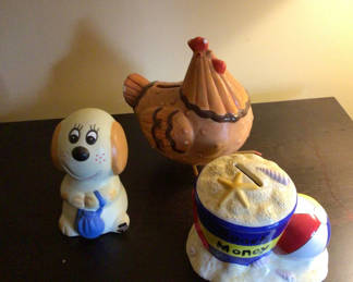 Lot 150: Ceramic dog, chicken, and sandcastle coin bank figurines