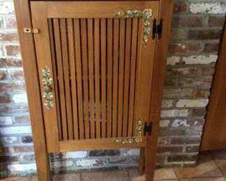Lot 42: Wooden cabinet with slatted vent-style door