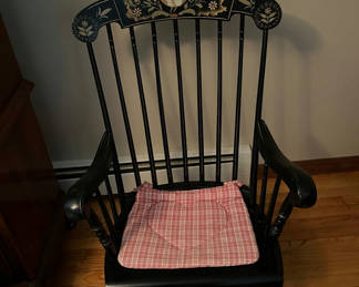 Lot 214: Black wooden rocking chair with heart-shaped plaid cushion