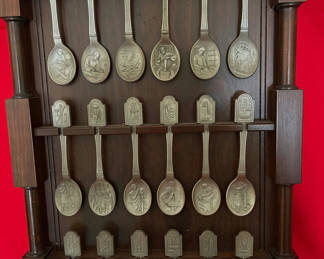 Lot 237: The Craftsmen of America Spoon Collection on Wooden Display Rack