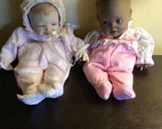 Lot 174: Two vintage cloth dolls in pink outfits