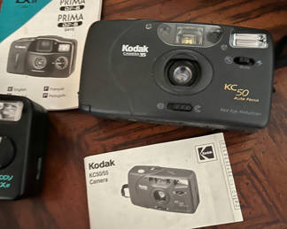 Lot 220: Vintage 35mm film cameras and accessories