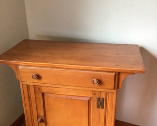 Lot 205: Wooden cabinet with top drawer and panel doors