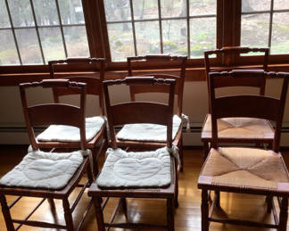 Lot 203: Wooden dining chairs with woven cane seats