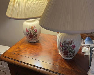 Lot 215: Pair of floral ceramic lamps