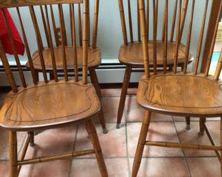Lot 29: Wooden dining chairs with spindle backs