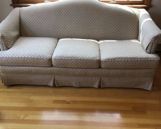 Lot 197: Beige patterned sofa