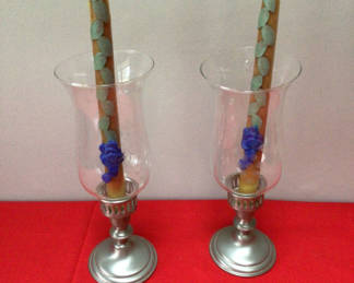 Lot 58: WHH pewter Pair of glass hurricane candle holders with decorative pillar candles