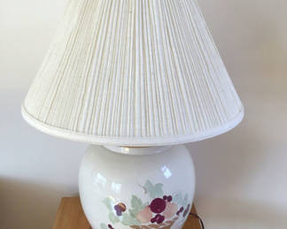 Lot 196: Ceramic fruit motif table lamp with pleated shade approx 22”