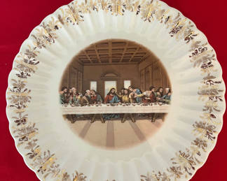 Lot 134: Decorative plate featuring The Last Supper with gold floral border