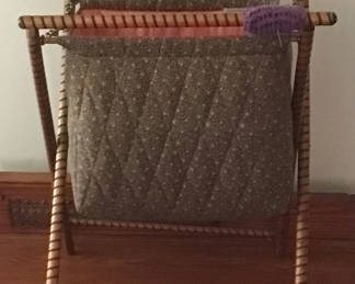 Lot 141: Wicker folding laundry rack with fabric bag