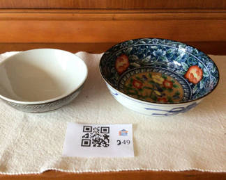 Lot 249: 2  ceramic bowls with blue-and-white patterns and gray/black designs