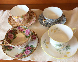 Lot 244: Floral china teacup and saucer set