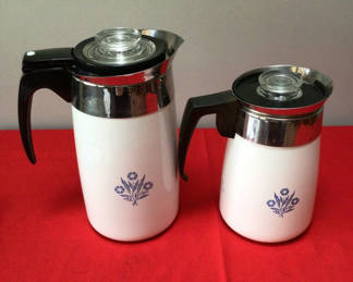 Lot 1: Two Corning Ware white enamel coffee pots with blue floral pattern