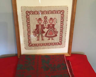 Lot 82: Extra-large holiday textiles with framed cross-stitch art
