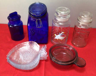Lot 16: Assorted blue and clear glass jars and dishes