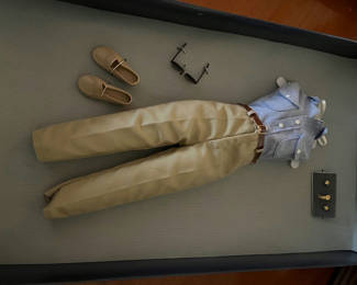 Lot 235: Princess Diana’s casual shirt, pants and accessories