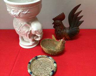 Lot 59: Decorative ceramic planter with floral relief, wooden rooster, wicker basket, and ceramic plate