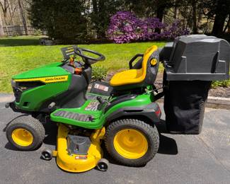 John Deere S170 mower with 48" deck, hydrostatic transmission, bagger system and John Deere 10P utility cart.  Well mantained.  Approx. 200 engine hrs.