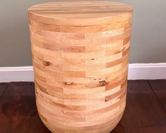 Light wood rounded accent table