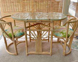 Ratan Table and Chairs (sold as set); glass top; three-season room furniture; excellent condition (needs cleaning)