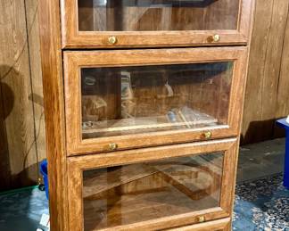 Wood and glass cabinet; four spaces 