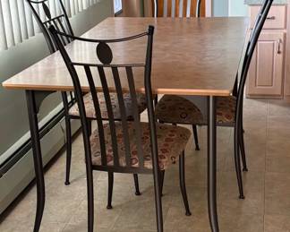 Amisco Dining Table And Chairs