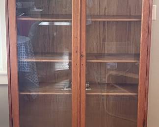 Solid oak glass front bookcase, early 20th century