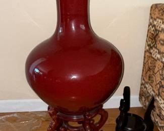 Chinese Sang de Boeuf Glazed Porcelain Vase with Wooden Stand