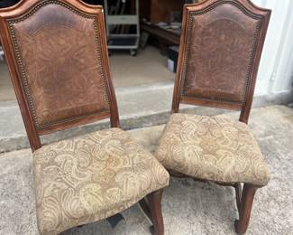 Pair leather back Jacobean style tall back chairs