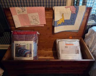 Old patch quilts, comforters, Lane chest 