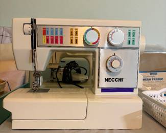Necchi 4575 mechanical sewing machine featuring a cast aluminum frame, a free arm, and 12 built-in stitch patterns
