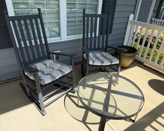 pair of plantation rockers and round coffee table