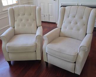 Lot #66 - Elegant Beige Wingback Reclining Accent Chairs with Button Tufting and Nailhead Trim
