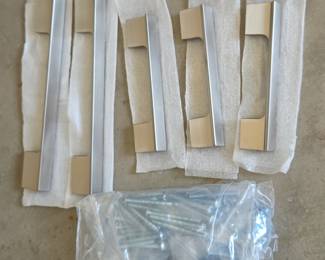 Lot #201 - Emtek Modern Cinder Cabinet Knobs Plus Aksano Brushed Nickel Cabinet Pull Handles