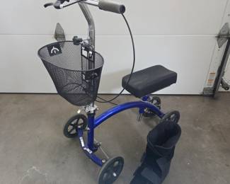 Lot #223 - Knee Cycle Steerable Knee Walker With Medical Aircast Walking Boot Support