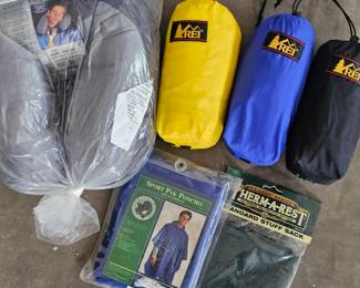 Lot #207 - REI Waterproof Pants & Jacket, Therm-a-Rest Stuff Sack, Samsonite Travel Pillow & Sport Pak Waterproof Poncho