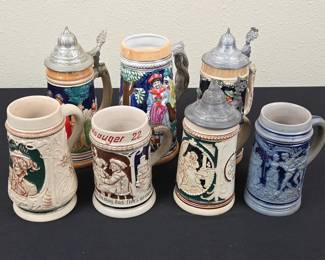 Lot #150 -  Vintage German Salt Glazed Stoneware Beer Steins with Pewter Lids and Relief Detailing