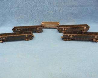 Lot 174. Four Lionel cars and one Gilbert